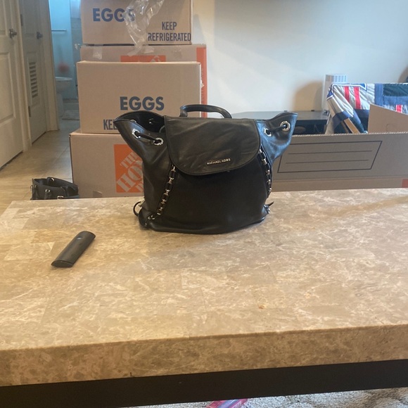 michael kors back pack used good